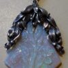Bernard Instone (attributed), Arts and Crafts carved opal silver pendant, circa 1930 SOLD