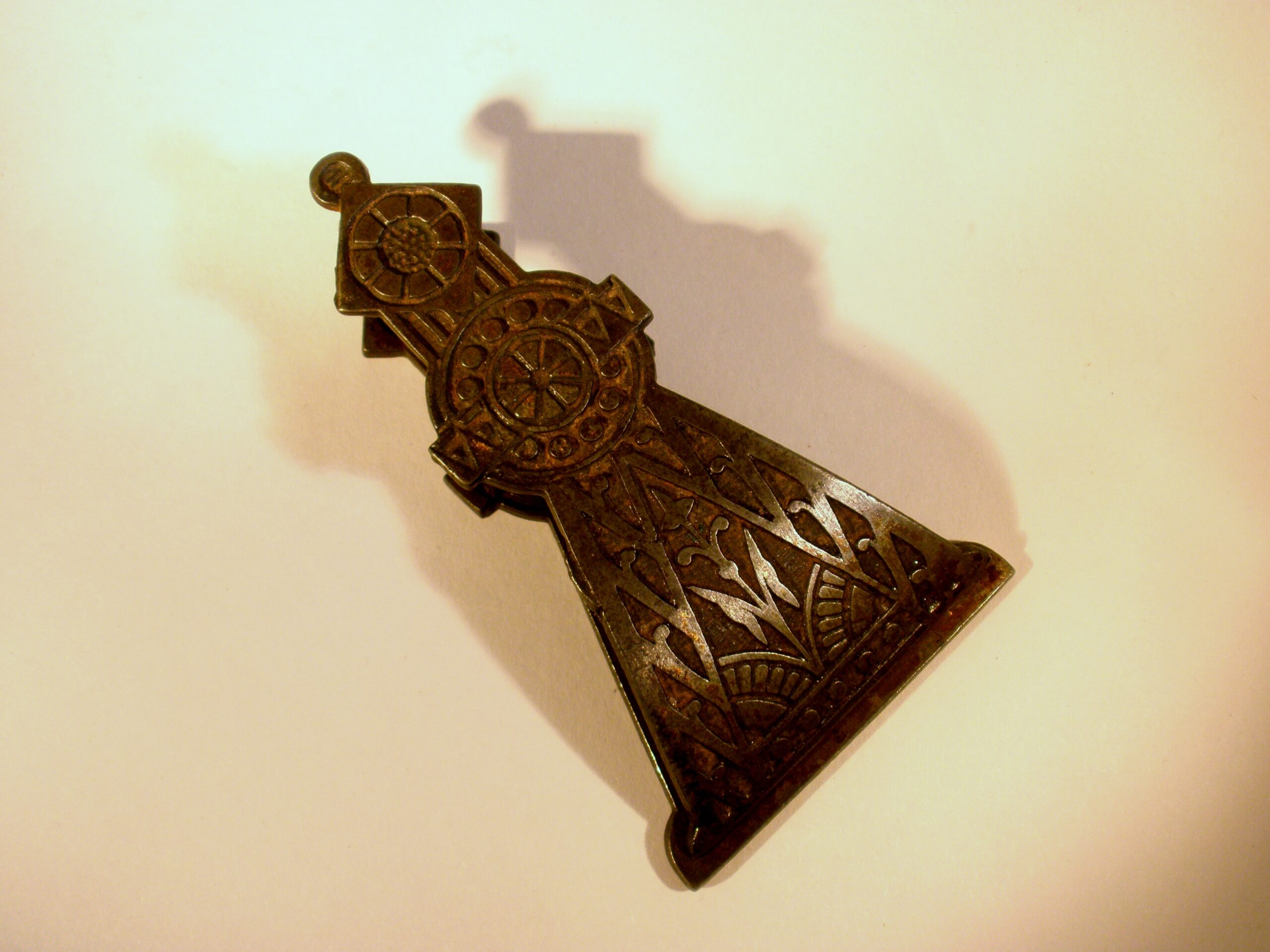 Christopher Dresser (in the style of), a cast iron Victorian paper clip, unmarked, circa 1885