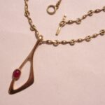 Bent Gabrielsen, 14 carat gold ruby pendant and chain, circa 1975 SOLD