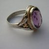 Anonymous Arts and Crafts amethyst silver and gold ring, English, circa 1908 SOLD