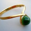 Ole Lynggaard, nephrite set gold hinged bangle, Denmark, circa 1978 SOLD