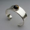 Poul Hansen, for Georg Jensen, tiger eye silver torque bangle, #188, Denmark, circa 1990 SOLD