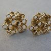 Graham Watling (in the style of), pair of 9 carat gold ear studs, London 1972 SOLD