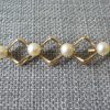 Elis Kauppi for Kupittaan Kulta, 14 carat gold cultured pearl set brooch, Finland, circa 1968 SOLD