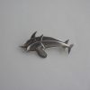 Arno Malinowski, for Georg Jensen, silver leaping dolphins brooch, #317, Denmark, 1992 London import mark SOLD