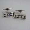 Bent Holse Petersen, for Georg Jensen, pair of silver and oxidized silver cufflinks, #115, Denmark, circa 1964 SOLD