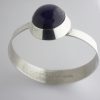 Ake Lindstrom, for Bengt Hallberg, cabochon amethyst set silver bangle, Sweden, circa 1965 SOLD