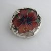 Moorcroft, 'Hibiscus' pattern roundel set in a silver brooch, maker MRB (untraced), Edinburgh 1989 SOLD