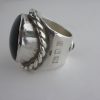 Michael Allen Bolton, black onyx and garnet silver ring, London 1976 SOLD