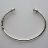 Michael Allen Bolton, garnet set silver torque bangle, London 1976 SOLD