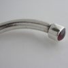 Michael Allen Bolton, garnet set silver torque bangle, London 1976 SOLD - Image 2