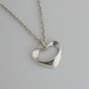 Henning Koppel for Georg Jensen, silver 'Nordic Heart' pendant on a chain, #152A, Denmark, 1999 (Ref S049 ) SOLD