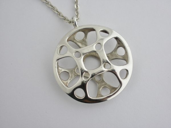 Frank and Regine Juhls, silver 'Sun Cross' pendant on chain, number 71 from the Historiske range, Norway SOLD