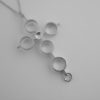 Jorma Laine, for Kultateollisuus Ky, a silver cross pendant on chain, Finland, 1974 SOLD