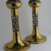 Pentti Sarpaneva, for Turun Hopea, pair of brass 'Pitsi' or 'Lace' candlesticks, Finland, circa 1973 SOLD