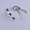 Jan Lundgren (1934-2017), amethyst and tourmalinated quartz set silver bangle, Sweden, 1961 (Ref S555) SOLD