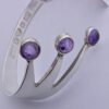 Jan Lundgren (1934-2017), amethyst and tourmalinated quartz set silver bangle, Sweden, 1961 (Ref S555) SOLD - Image 3