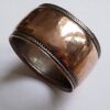 Artificers Guild (attributed), an Arts and Crafts copper and silver Libra zodiac symbol napkin ring, circa 1925 SOLD - Image 4