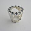 Aremo of Mauritius, blue cubic zirconia set heavy silver 'Halo' ring, 2007 (Ref S715) SOLD
