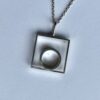 Arne Johansen, silver minimalist pendant on chain, Denmark, circa 1970 (S+203) SOLD