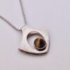 Kultaseppa Salovaara, tiger eye set silver pendant on a chain, Finland, circa 1975 (Ref S+223)