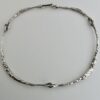 James Silver Forge, brutalist style four part silver neck ring, Trelleborg, Sweden, 1985 (Ref S+387) SOLD