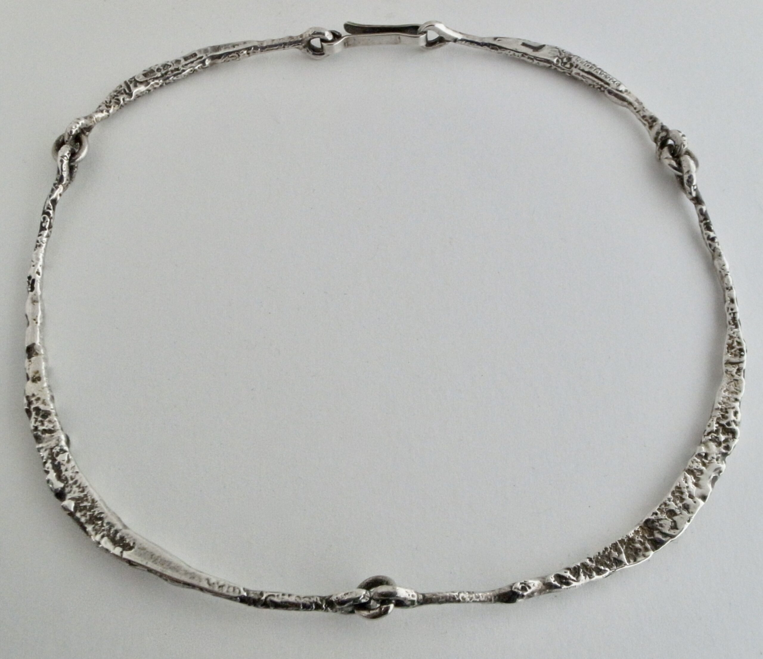 James Silver Forge, brutalist style four part silver neck ring ...