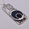 Cado Designs, abstract silver and black resin decorated pendant on a chain, Sheffield 1973 (Ref S+487) SOLD - Image 2
