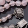Anonymous, graduated row of rose quartz beads to a rose quartz set silver clasp, Birmingham, circa 1950 (Ref S+553) SOLD - Image 6