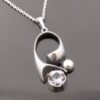 Karl Laine for Sten & Laine, rock crystal set silver pendant on chain, Finland, 1974 (Ref S+650)