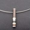Maker unknown, mixed metal pendant on a wire neck ring, retailed by Diana Porter, Contemporary Jewellery Gallery, Bristol, possibly by SIM of Germany?, circa 2010 (Ref S+670) SOLD - Image 4