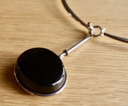 Torun Bülow Hube for Georg Jensen, silver neck ring, No. 410, with a black onyx drop pendant, No. 311C, circa 2015 (Ref S+689HH) - Image 2