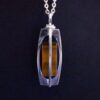 Elis Kauppi for Kupittaan Kulta, tiger eye silver pendant on chain, Finland, circa 1975 (Ref S+921) SOLD