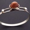 Martti Viikinniemi (attributed), 'goldstone' cabochon set 830 standard silver bangle, Finland, circa 1975 (ref S+961) - Image 2