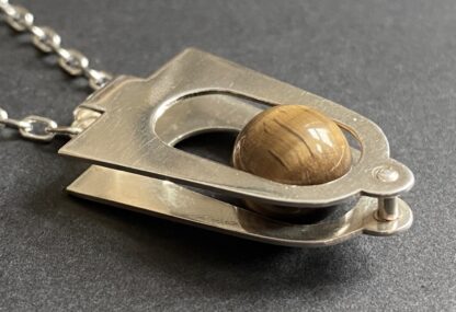 Kultaseppa Salovaara, kinetic tiger eye set silver pendant on a chain, Finland, circa 1970 (Ref S+978) SOLD - Image 2