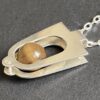 Kultaseppa Salovaara, kinetic tiger eye set silver pendant on a chain, Finland, circa 1970 (Ref S+978) SOLD - Image 4