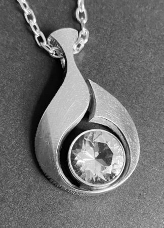 Karl Laine for Sten & Laine, rock crystal set silver pendant on chain, Finland, circa 1970 (Ref S+1000)