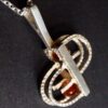 Unknown, silver and carnelian two bead kinetic pendant on chain, Denmark, circa 1975 (Ref S+976) - Image 2