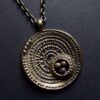 Jorma Laine for Turun Hopea (probably), small version bronze 'Sombrero' pendant on chain, from the Chic series, Finland, circa 1975 (Ref S+1004)