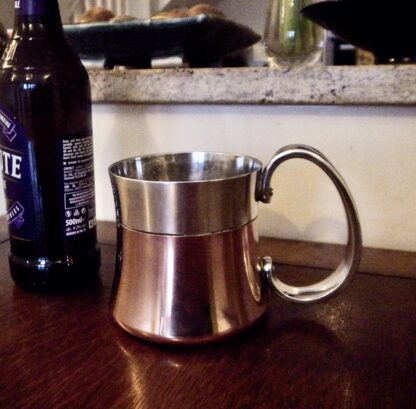 Henning Koppel for Georg Jensen, copper and steel 'Taverna' mug, Denmark, 1970s (Ref S+2180) SOLD