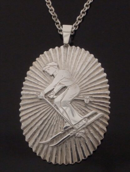 Stuart Devlin, silver 'Skier' pendant on chain, London 1976 (Ref S+2239)