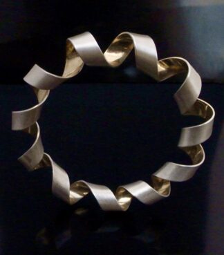 Martyn Pugh, silver and silver gilt Coil Bangle, Birmingham, circa 2000 (Ref S+2347) SOLD