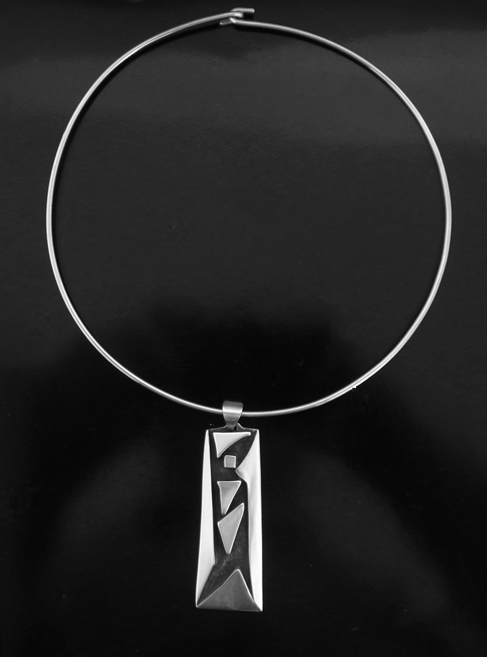 CF (maker unknown), silver cast drop pendant on a neck ring, country unknown, circa 1975 (Ref S+2442) SOLD
