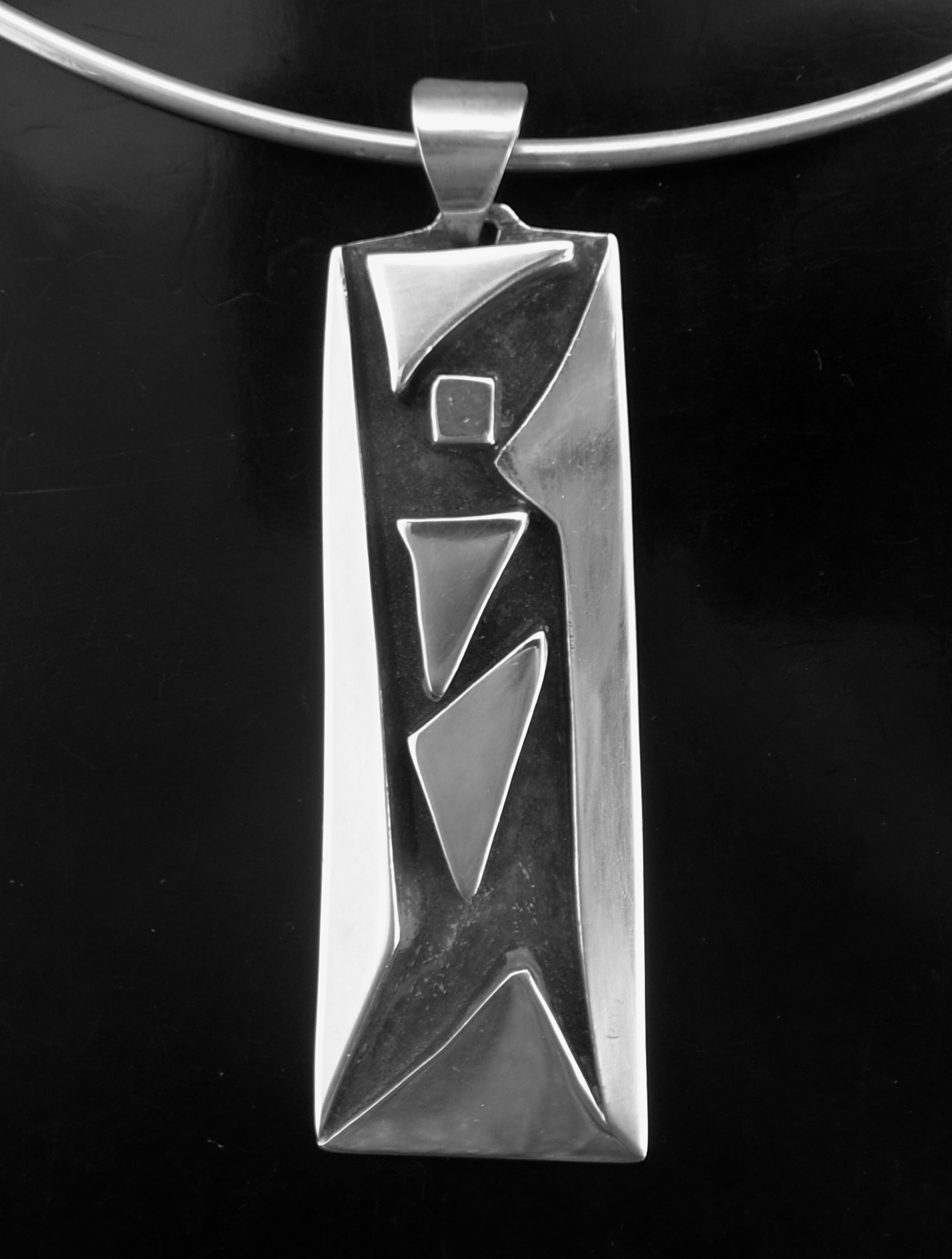 CF (maker unknown), silver cast drop pendant on a neck ring, country unknown, circa 1975 (Ref S+2442) SOLD - Image 2