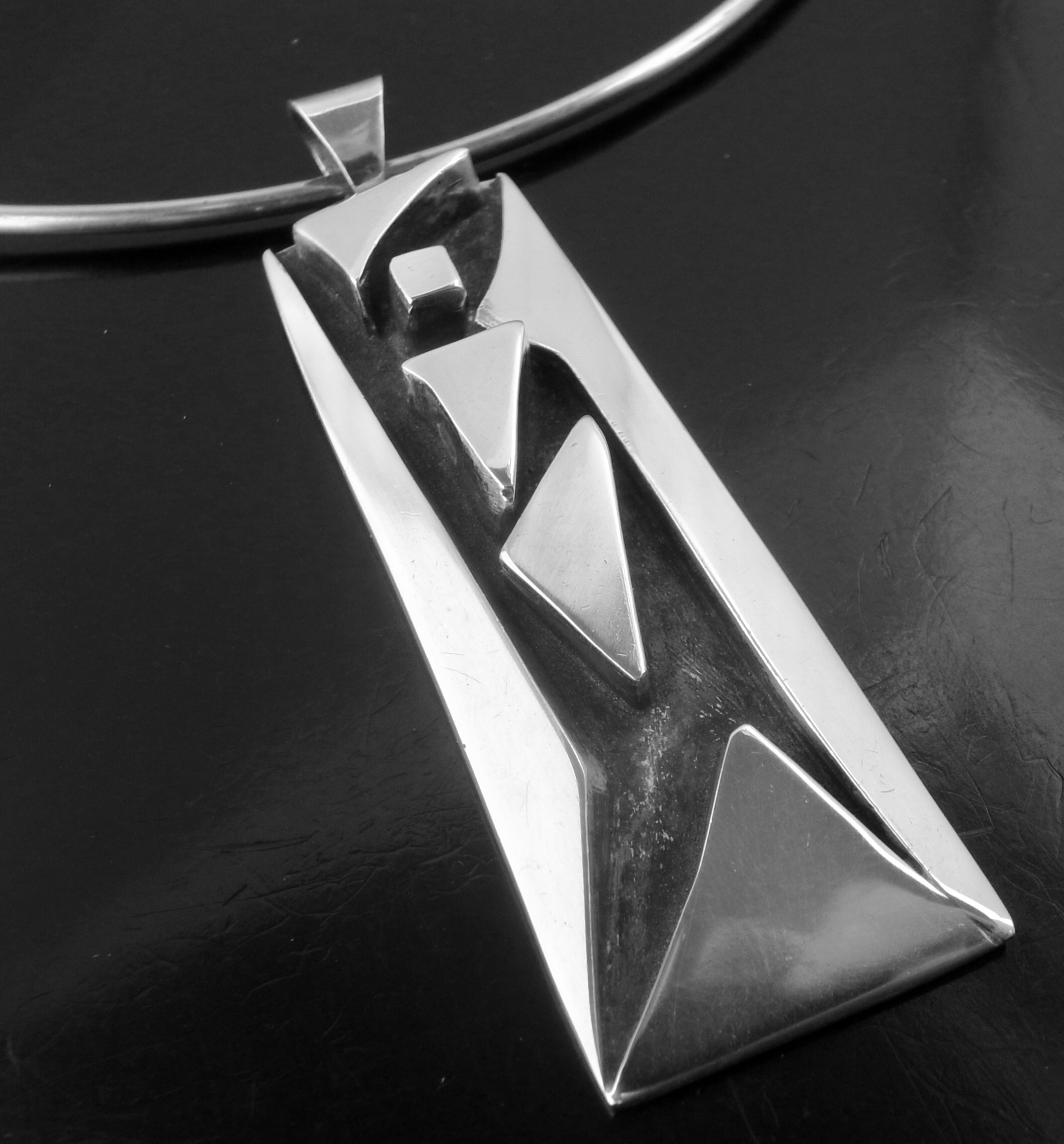 CF (maker unknown), silver cast drop pendant on a neck ring, country unknown, circa 1975 (Ref S+2442) SOLD - Image 3